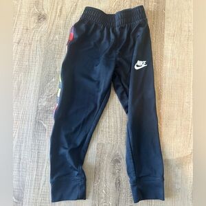 Nike Boys size 4 Black Joggers with Multicolor Stripe